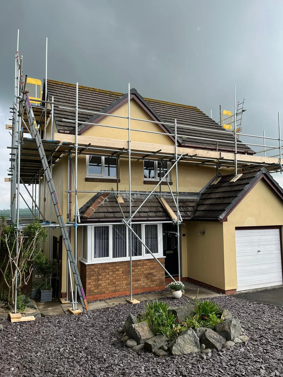 Residential scaffold providing access for fascia and guttering work