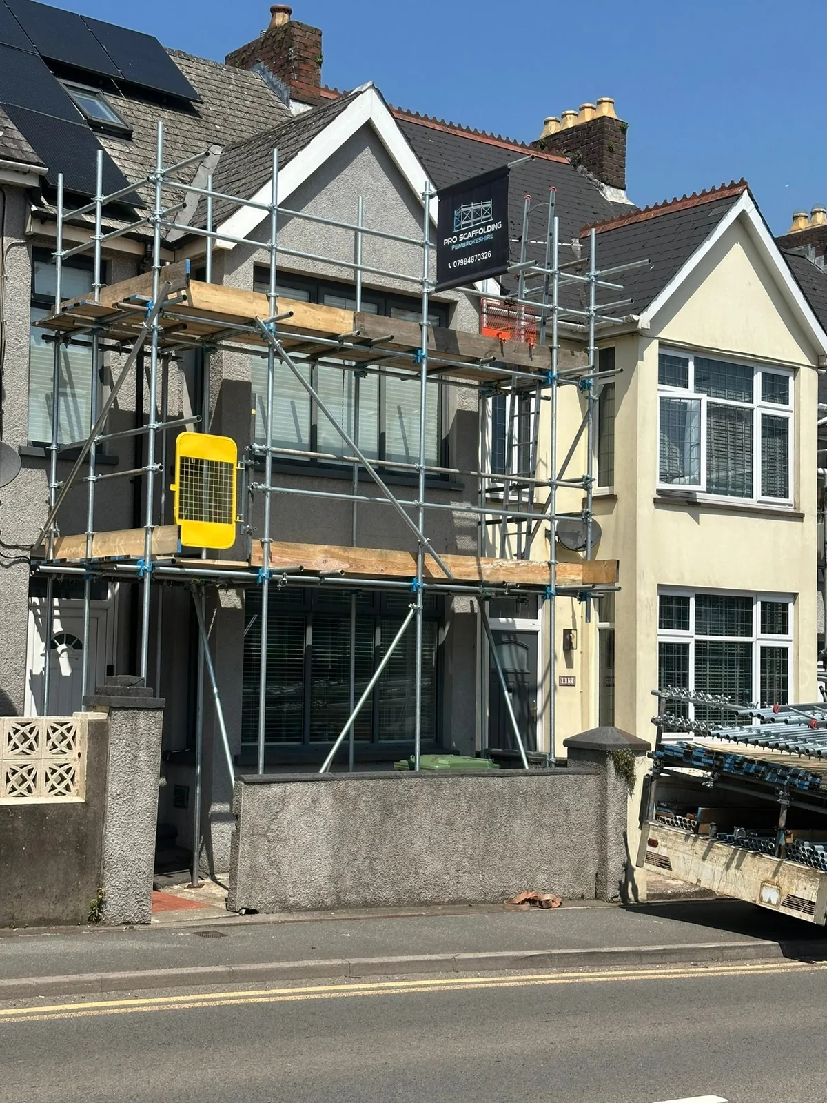 Scaffold across the front of a residential property
