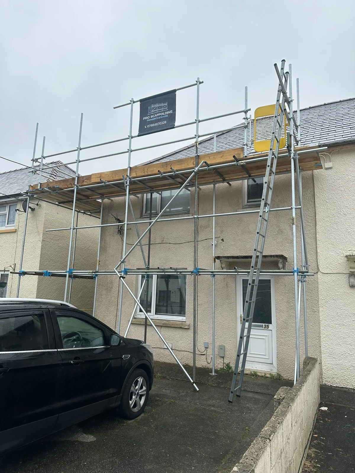 Front scaffold erected for roofing access