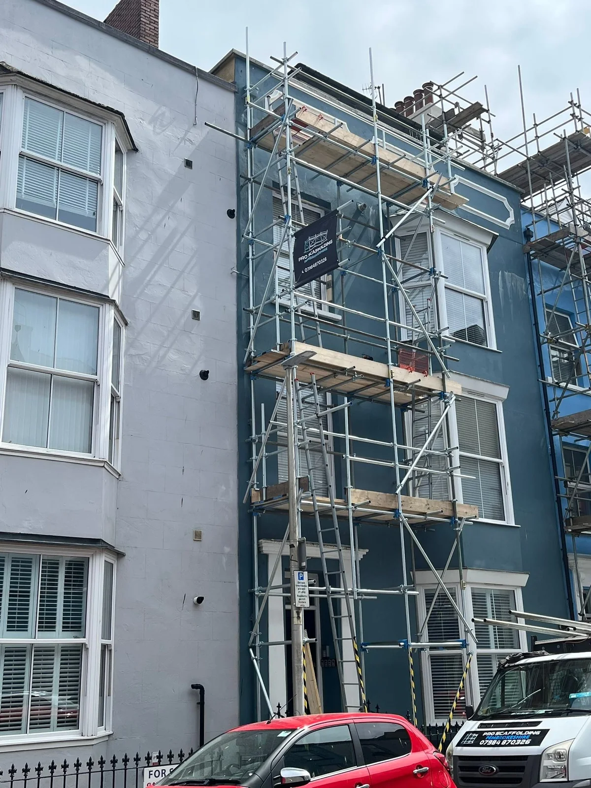 Scaffolding on the front of a tall Tenby property